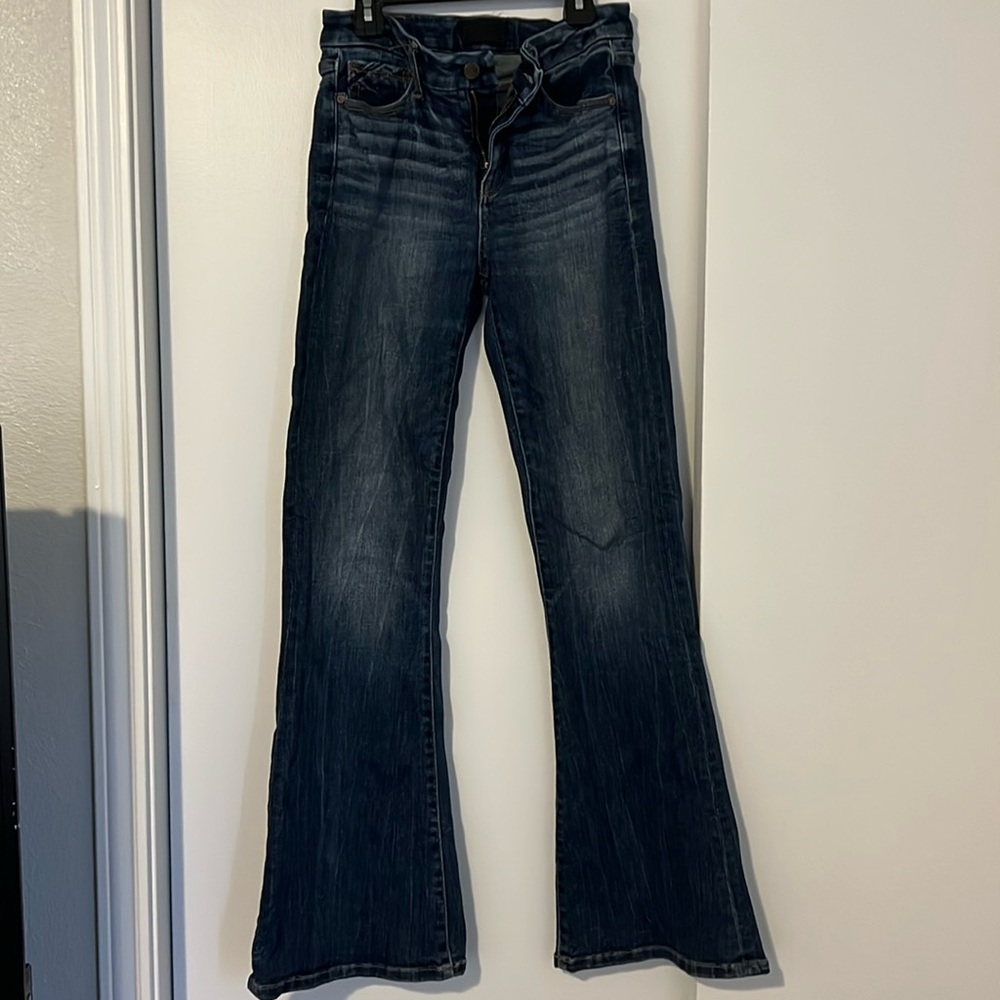 Women’s buckle dark wash jeans